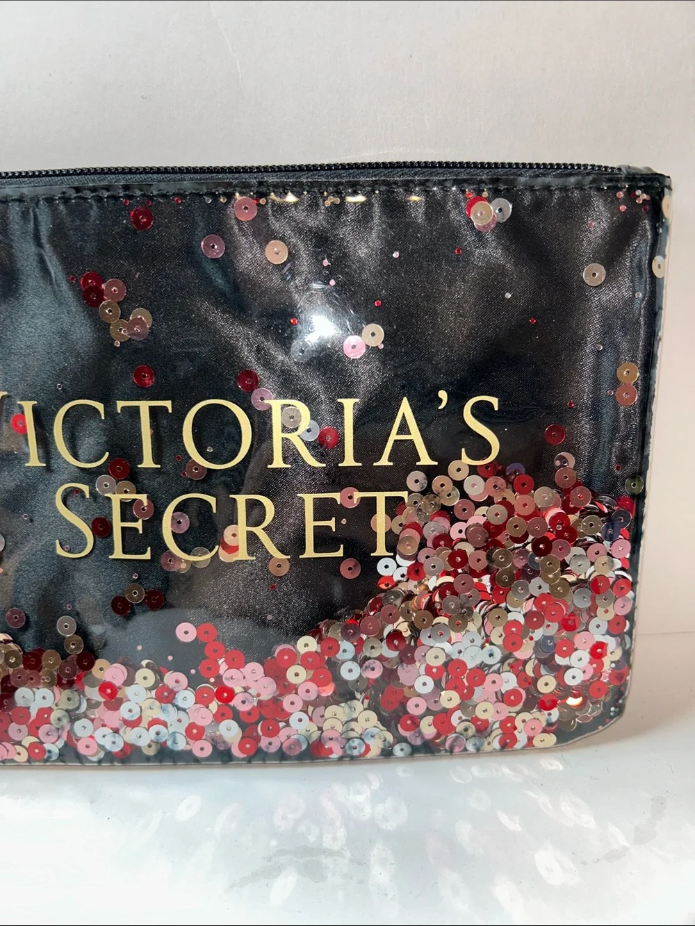 Victoria's Secret Floating Confetti Sequin Wristlet Pouch.